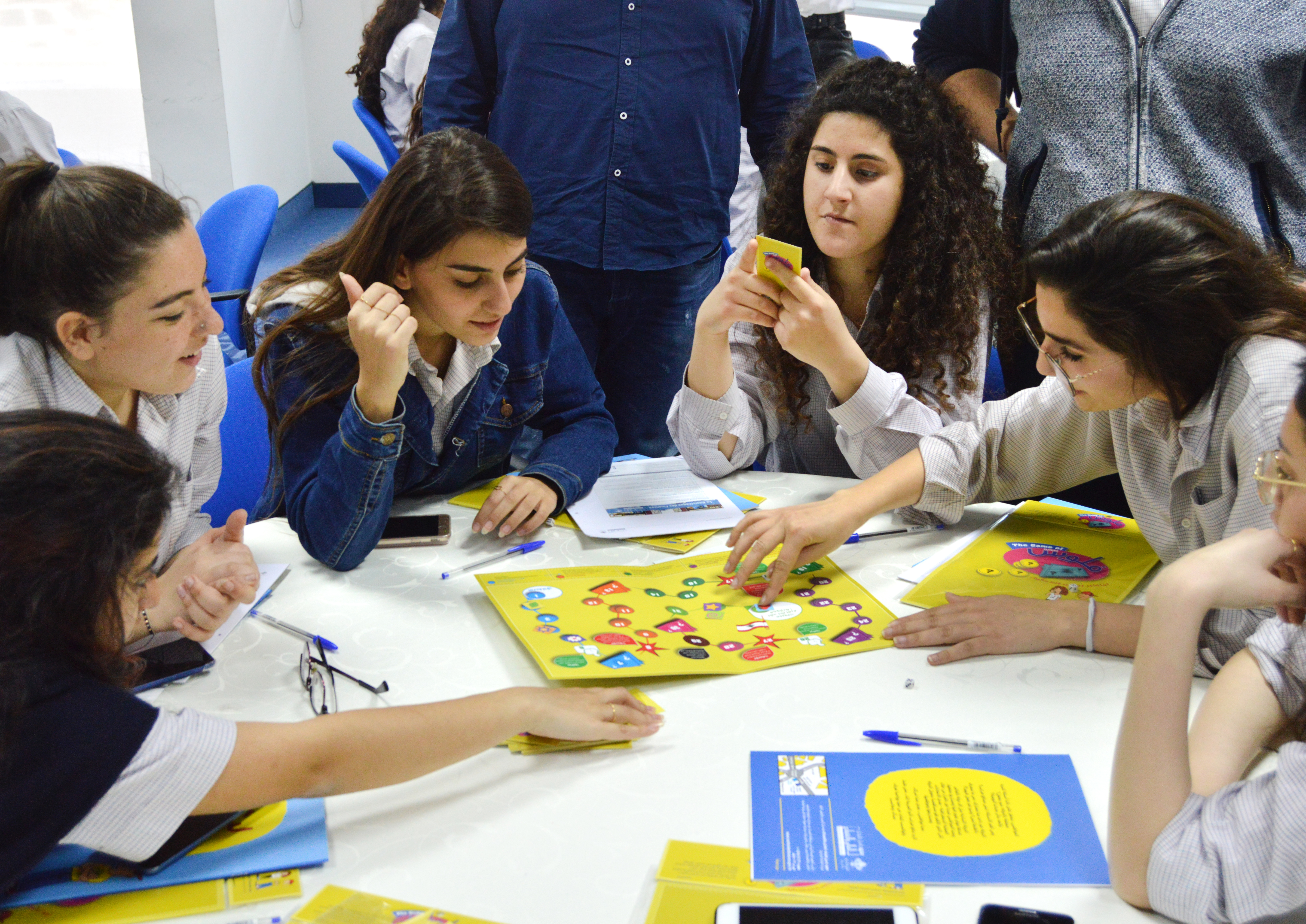 youth around a table